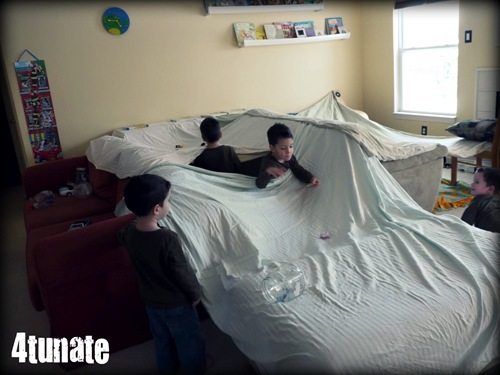 building a fort with sheets