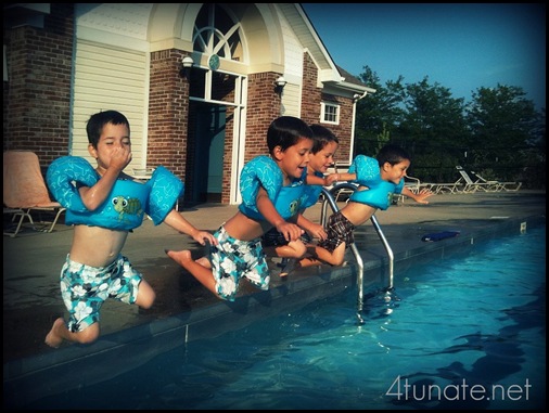 kids jumping in the pool