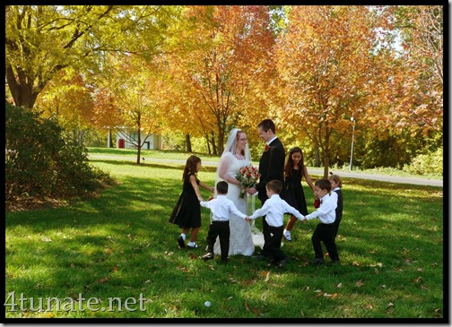 playing ring around the rosie for wedding pictures