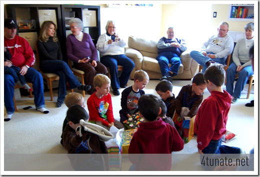 birthday boys party opening gifts