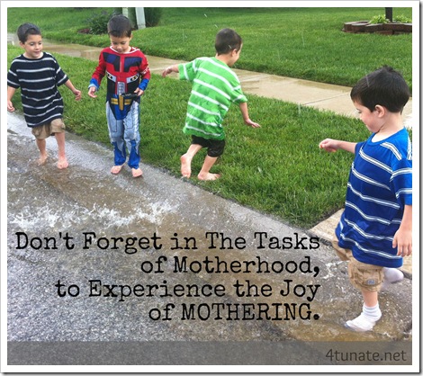 joys of motherhood splashing in puddles