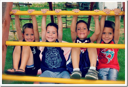 5 year old quadruplet boys playing outside